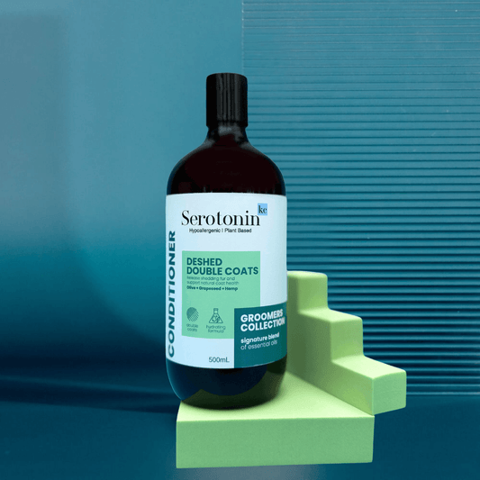 Bottle of SerotoninKC Groomers Collection Deshed Double Coats Conditioner