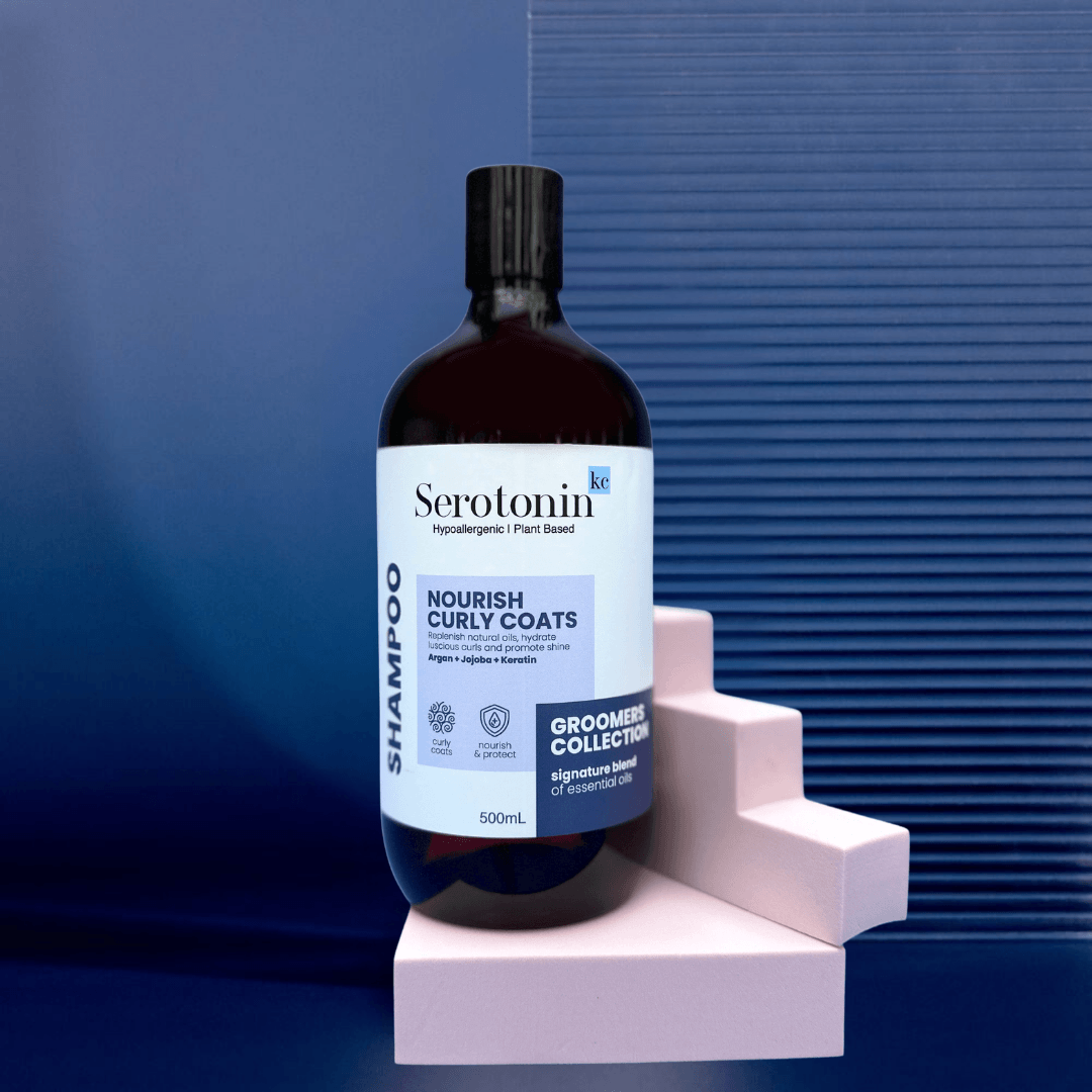 Bottle of SerotoninKC Groomers Collection Nourish Curly Coats Shampoo